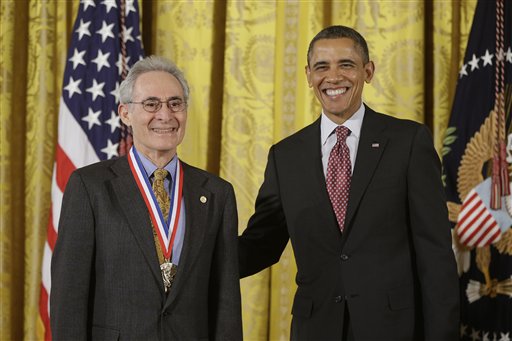 President Barack Obama awards the National Medal of Science to Dr. Barry Mazur of Harvard University, Friday, Feb. 1, 2013, during a ceremony in the East Room of the White House in Washington. The awards are the highest honors bestowed by the United States Government upon scientists, engineers, and inventors. (AP Photo/Charles Dharapak)