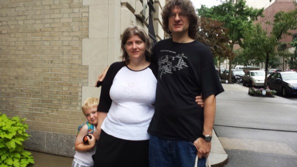 An unflattering yet adorable picture. You can see we're both instructing our 11-year-old on how to take a picture and our 4-year-old is squeezing in too. He's not shy.