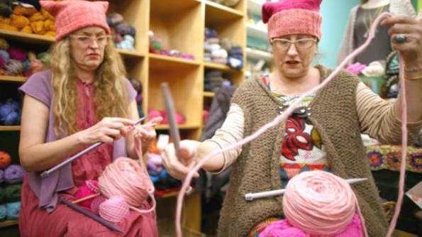 Molly Cleator takes part in the Pussyhat social media campaign to provide pink hats for protesters in the women's march in Washington, D.C., the day after the presidential inauguration, in Los Angeles, California